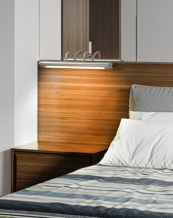 Versatile Bradley Bar Light: Picture light or bedside sconce. Soft glow from LED strip with opal white cover. Versatile and elegant lighting solution.