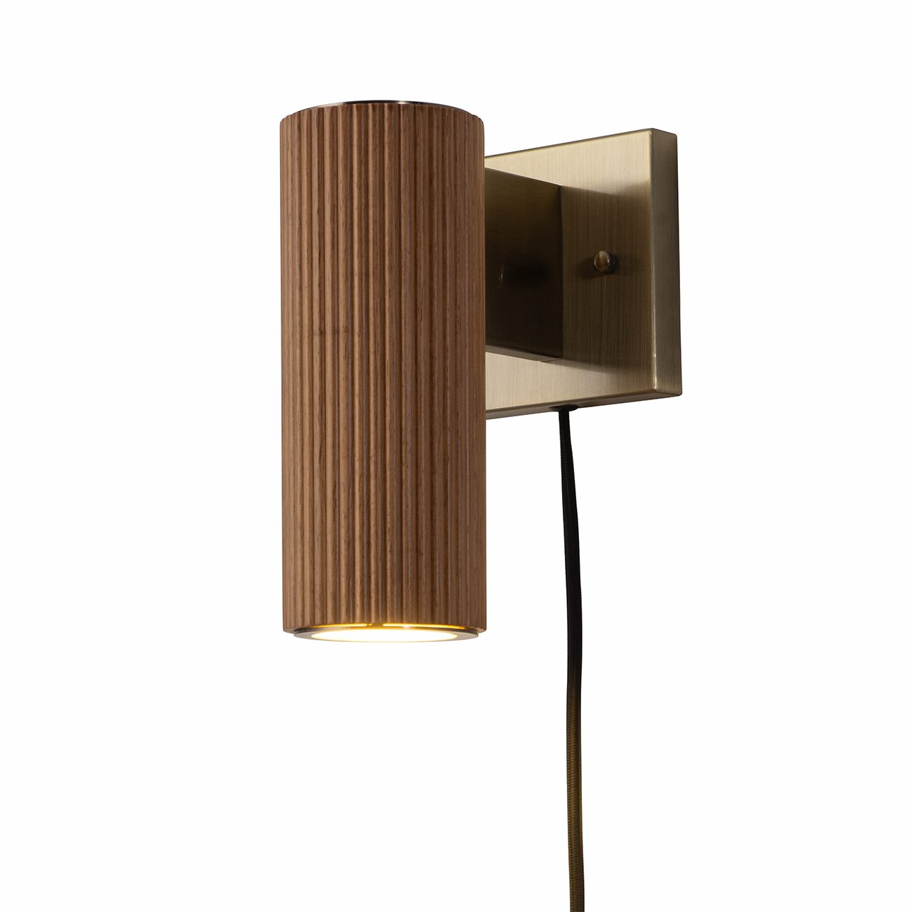 Tambo Wall Sconce in Ash and Brass with Warm Ambient Glow