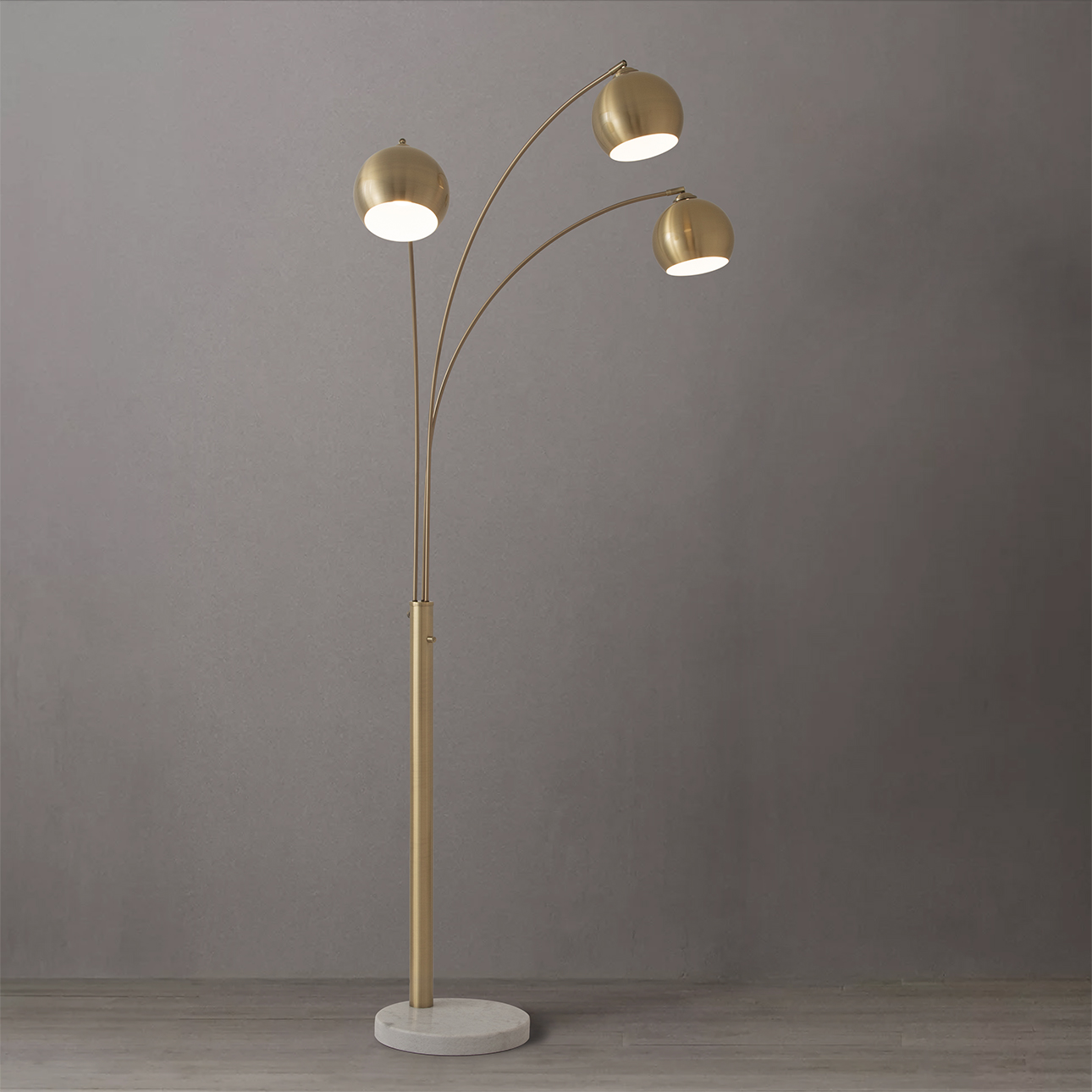Triplet Three Light Arc Floor Lamp in Weathered Brass with White Marble Base